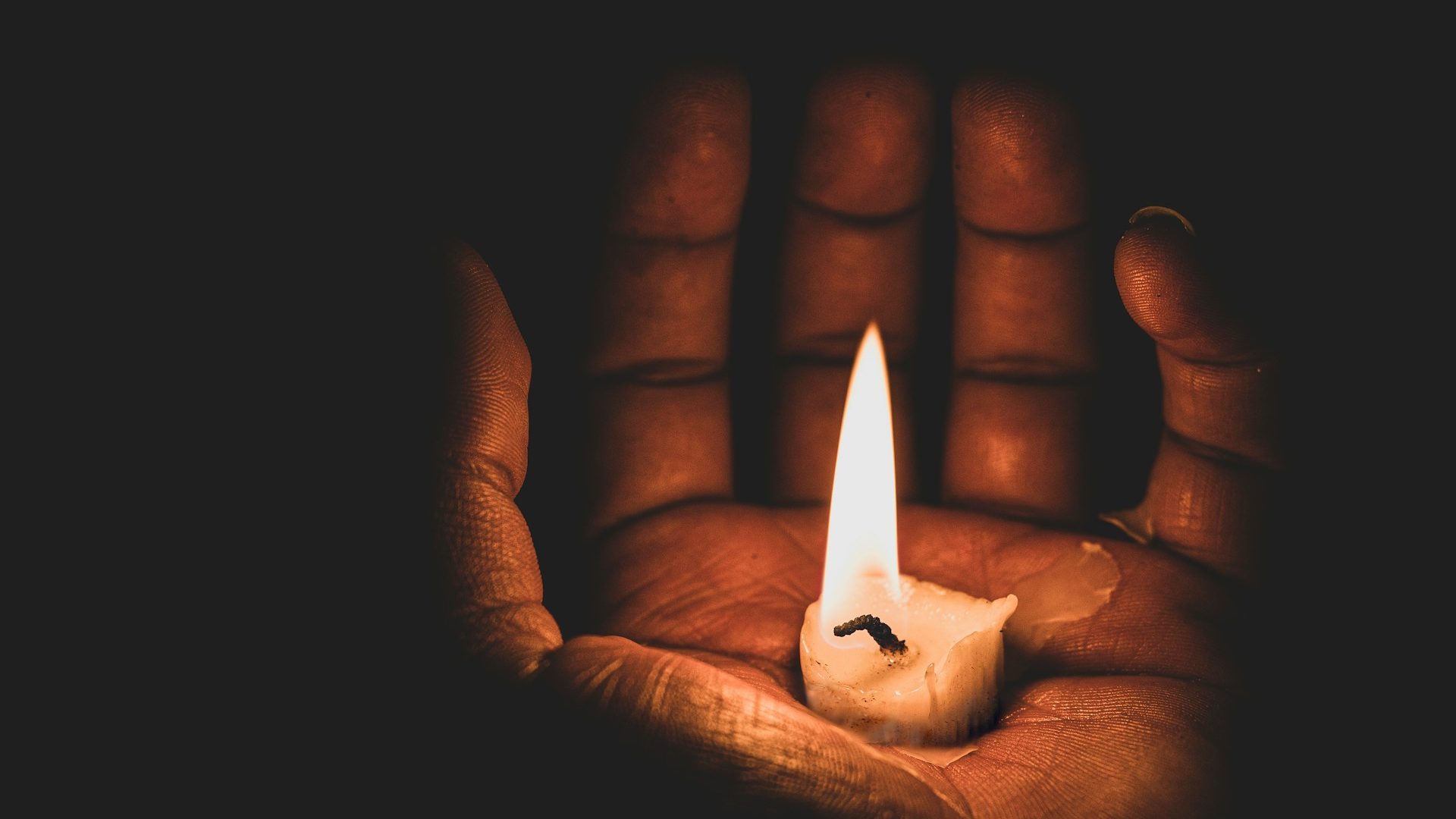 fire about to burn hand